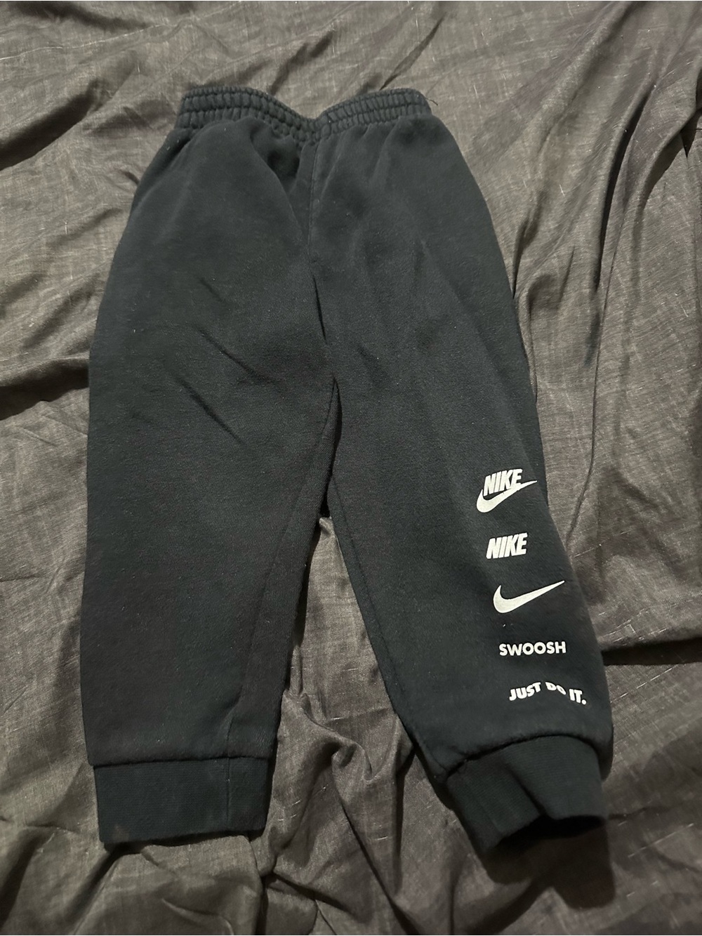 Nike Black Kids Logo Joggers with White Graphics